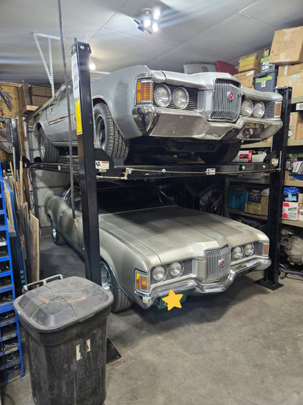 Space-saving storage parking lift installed in a customer garage